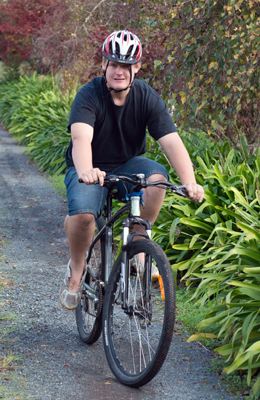 Toby enjoys riding his bike 