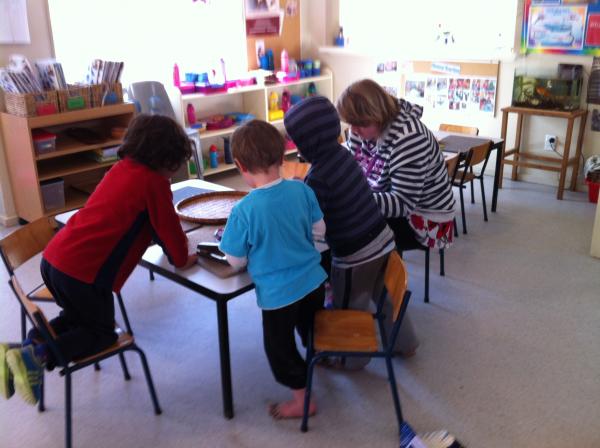 Youngsters at the table with Cara